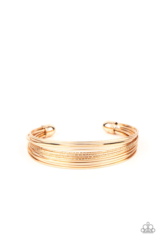 Paparazzi This Girl Is On WIRE - Gold Cuff Bracelet